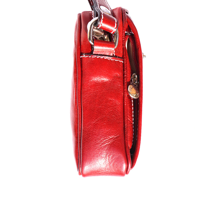 Small travel bag with shoulder strap in genuine cow leather-1
